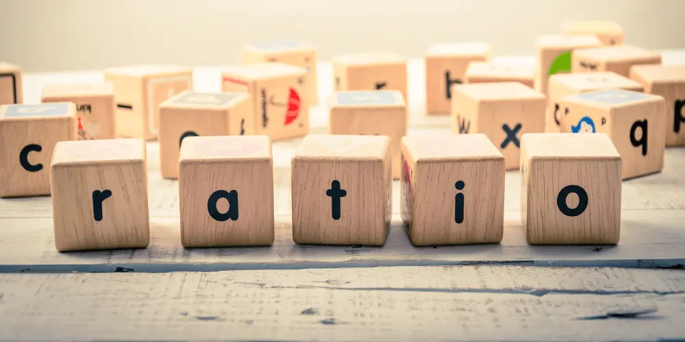 Wooden blocks spelling ratio—highlighting the importance of rent-to-income ratio before signing a lease.