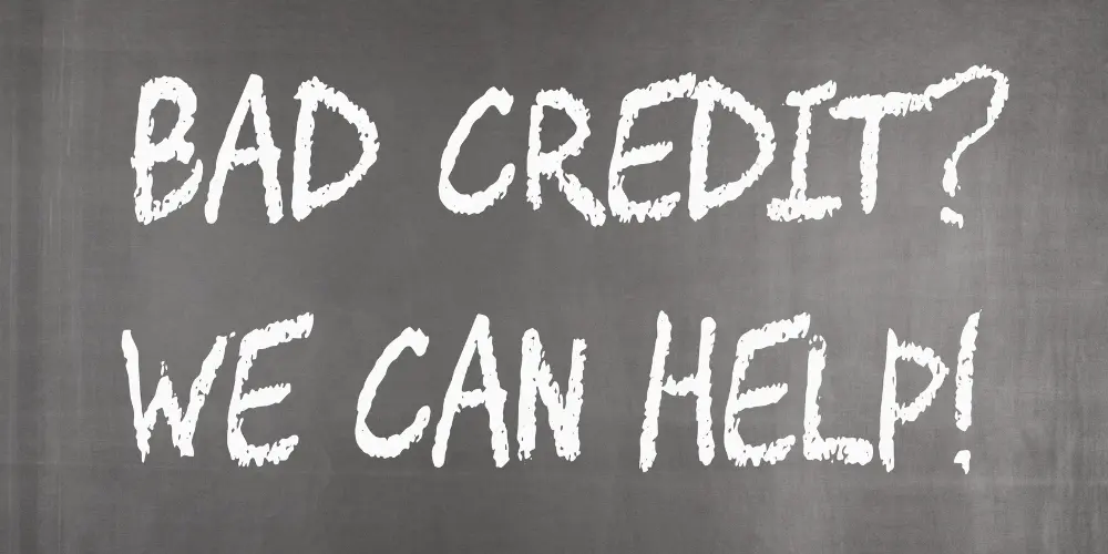 Chalkboard text offering help with bad credit—find rental help and guidance for tenants with low credit scores.
