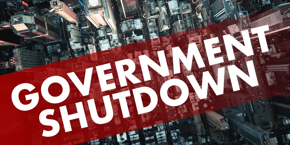 Graphic of a government shutdown headline across city buildings, reflecting income loss and money stress during federal closures.