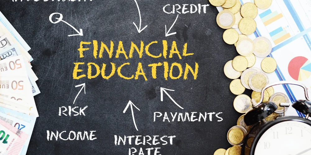Financial education concepts on chalkboard with money, coins, and charts showing credit, income, and interest basics
