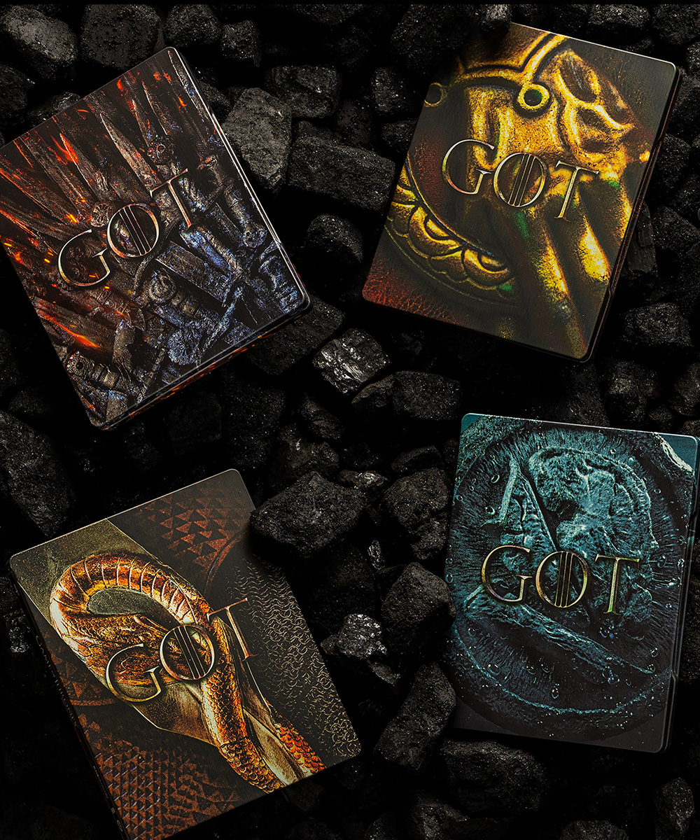 A selection of the DVD cases that Quietly Studio designed for HBO's Game of Thrones.