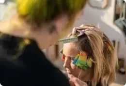 Hairstylist using Booksy app
