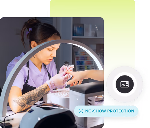 Black leather barber chair with a credit card icon in a circular overlay above it on a pink background.