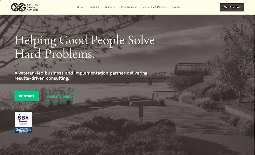 Screenshot of CGA's homepage showing a full width background photo of the Vancouver, Washington water front with a dark coffee colored overlay and titles.
