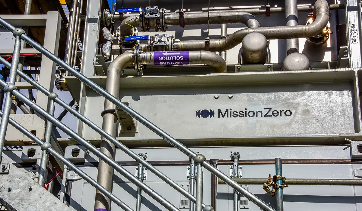Steelwork and pipes on the outside of a direct air capture unit.
