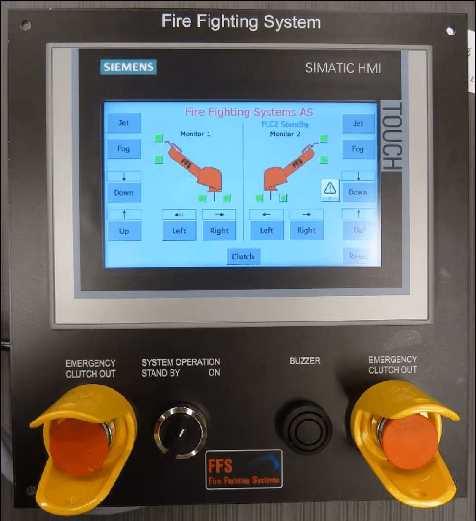 Fire fighting system control panel with touchscreen display and emergency clutch out buttons.