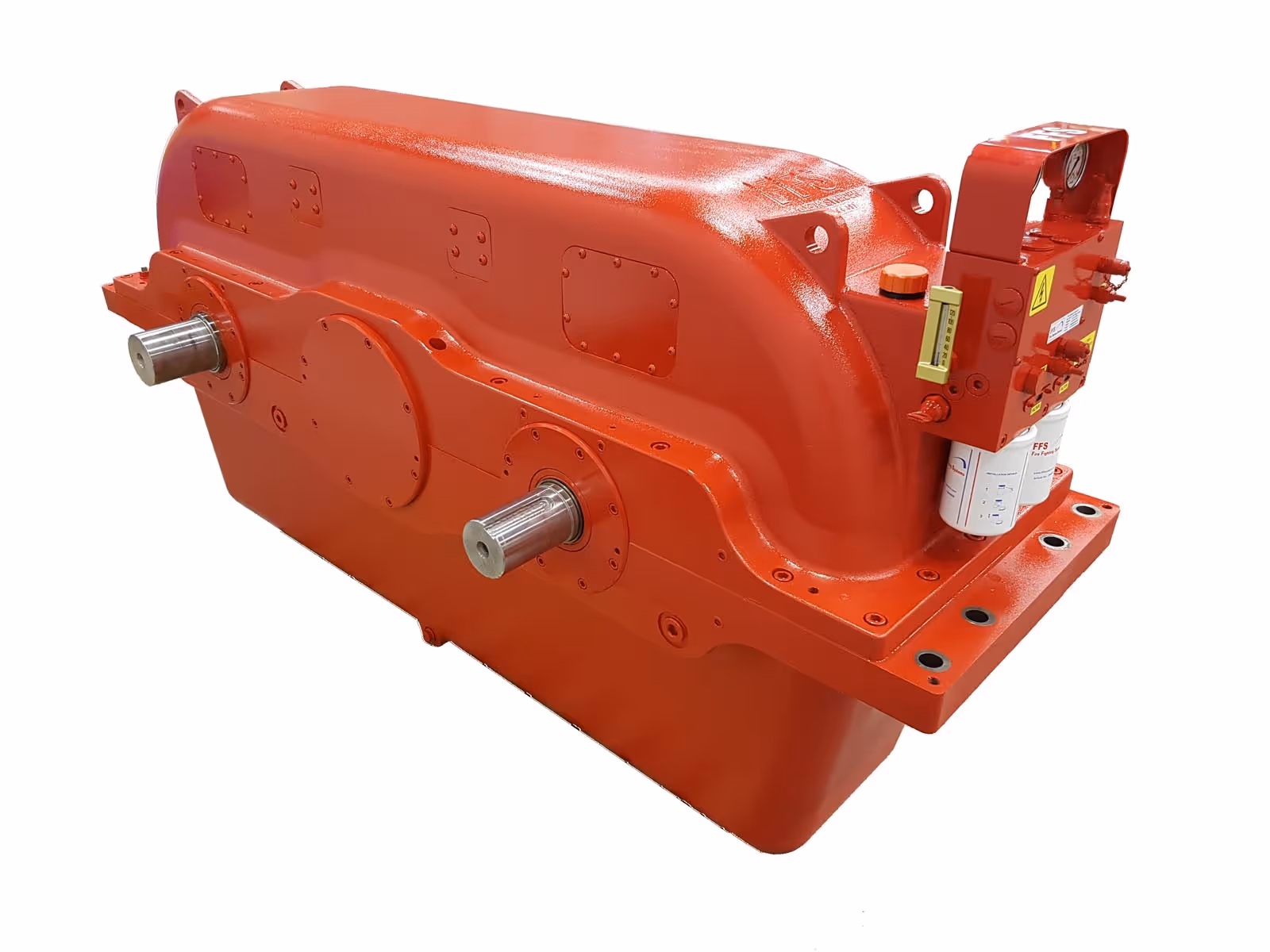 Large industrial red gearbox with two exposed cylindrical shafts on one side and a control panel with gauges and filters on the other.