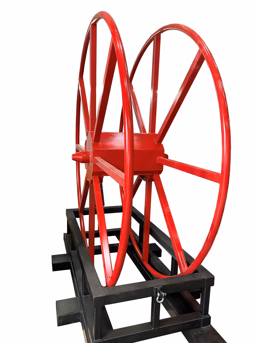 Large red double wheel mounted on a black metal frame.