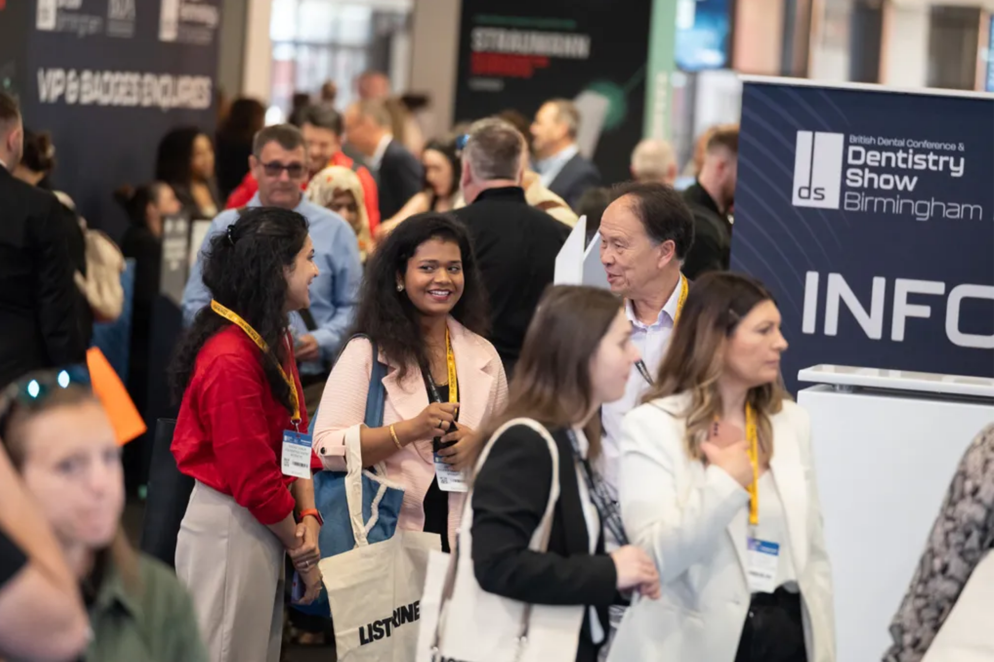 Dental exhibition stands and BDA theatre signage at Dentistry Show Birmingham showcasing dental suppliers and innovations