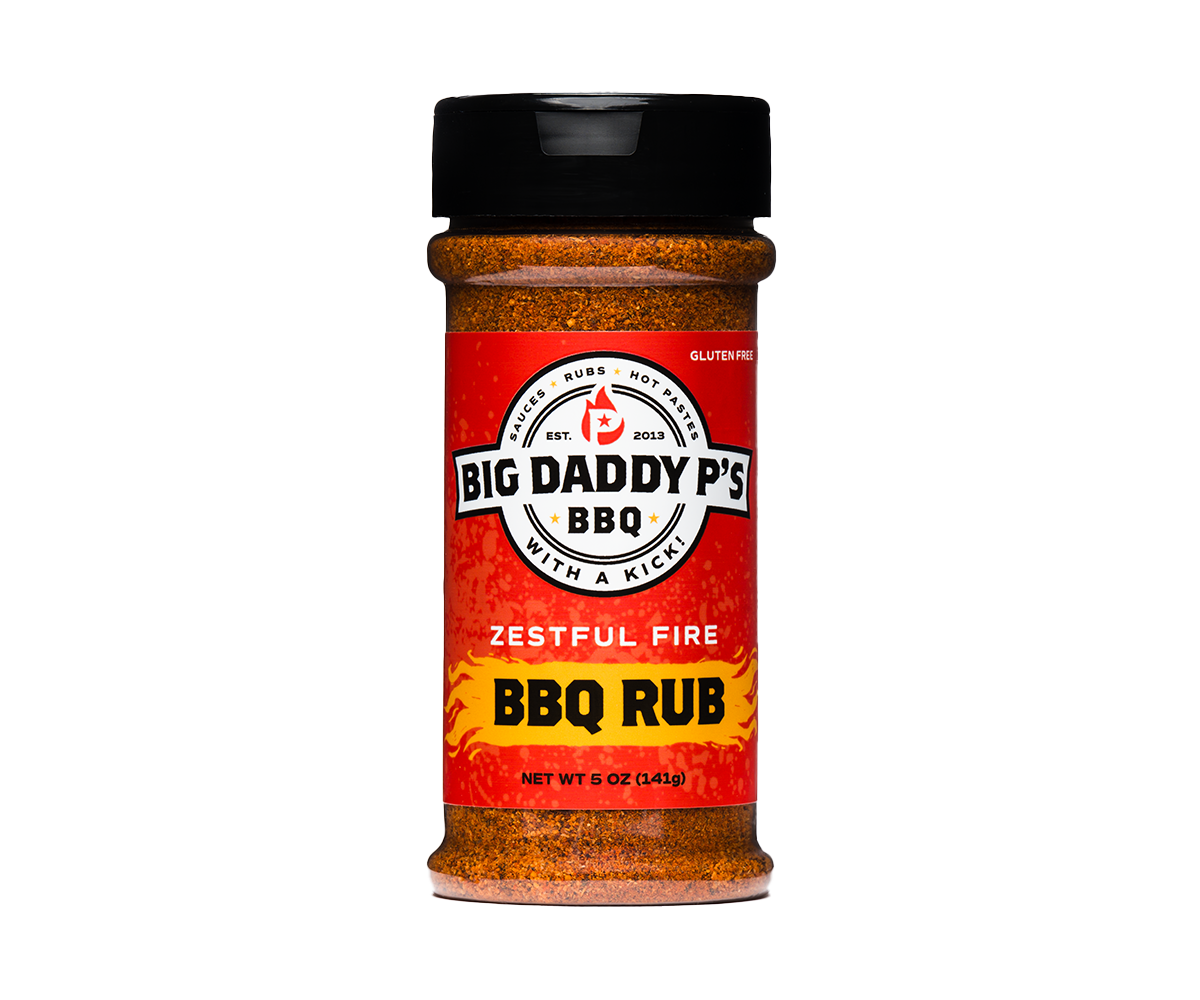Bottle of Big Daddy P's BBQ Rub Zestful Fire seasoning with a black lid and red label.