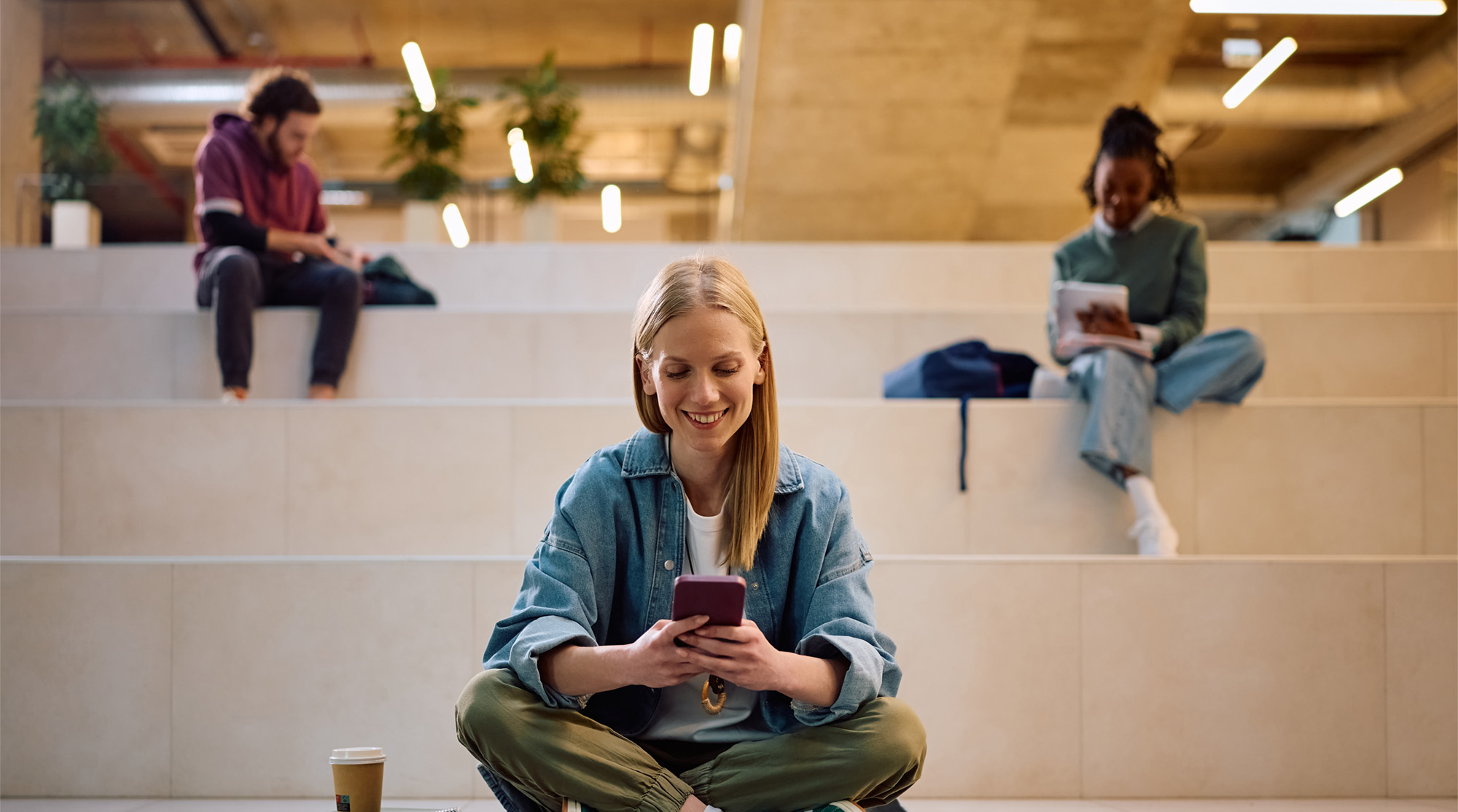 Person using Brightn mental wellness app as part of a daily workplace mental health routine