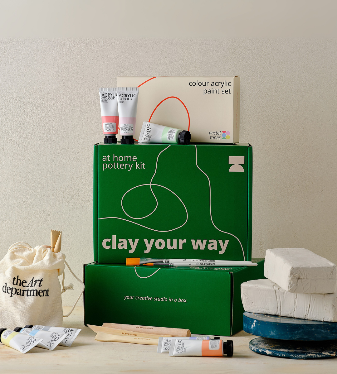 Hands engaged in the art of pottery, creating beautiful clay masterpieces at The Art Department, Newcastle