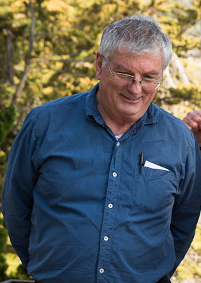 Older make with grey hair and glasses