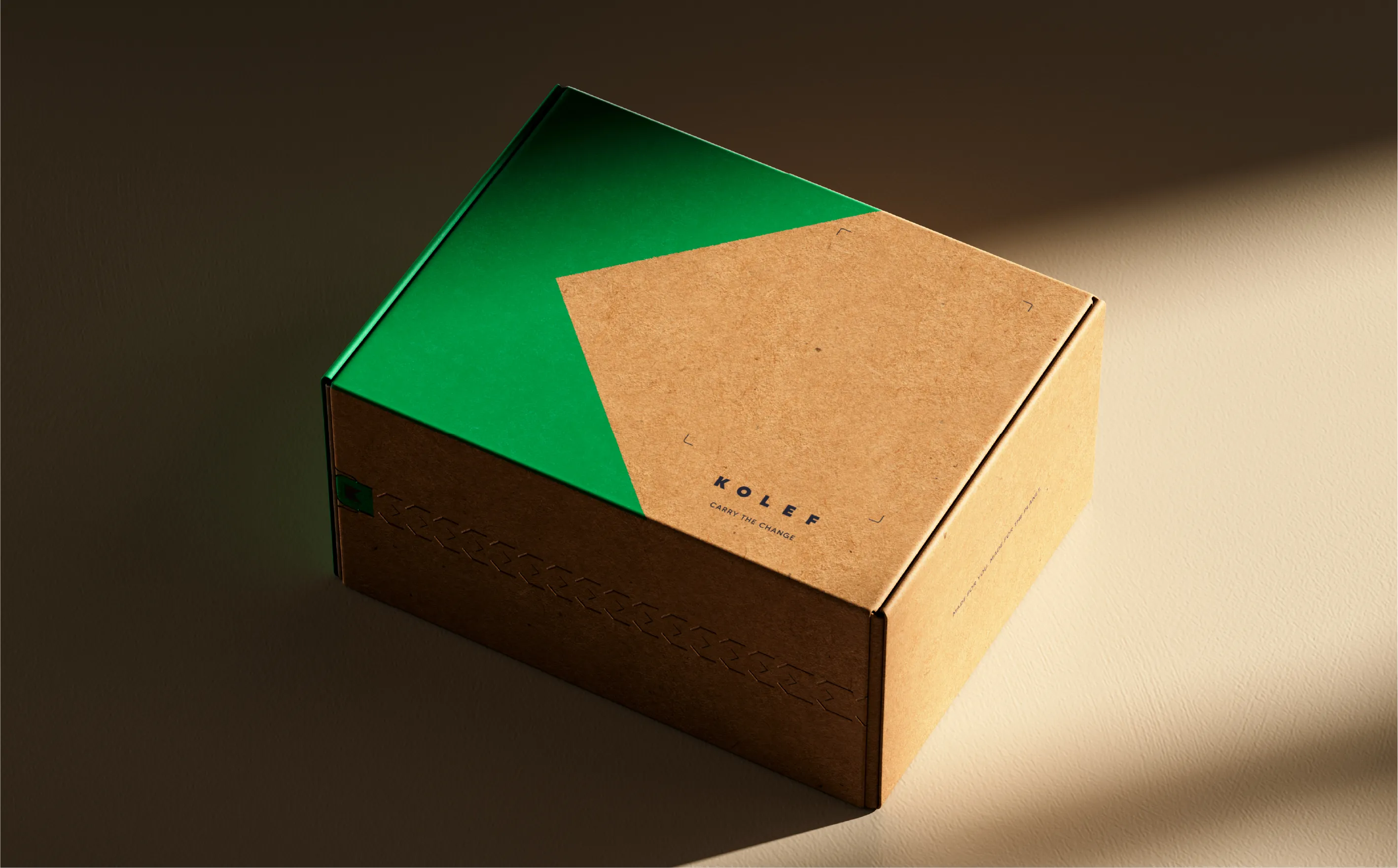 WeAreDepot Packaging Design, KOLEF natural kraft shipper box with bold geometric green K mark, Australian accessories brand