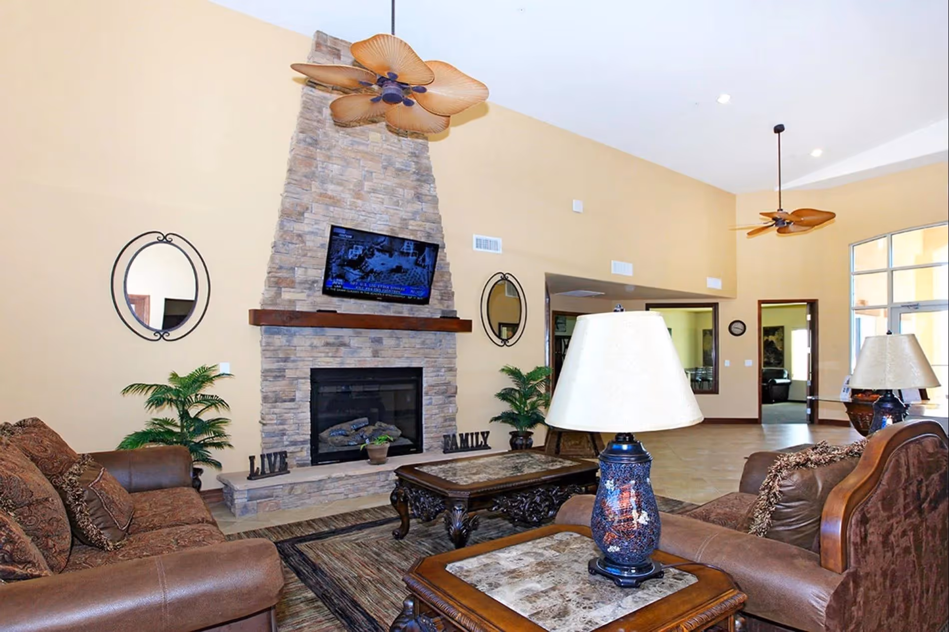 Lobby area with stone fire place