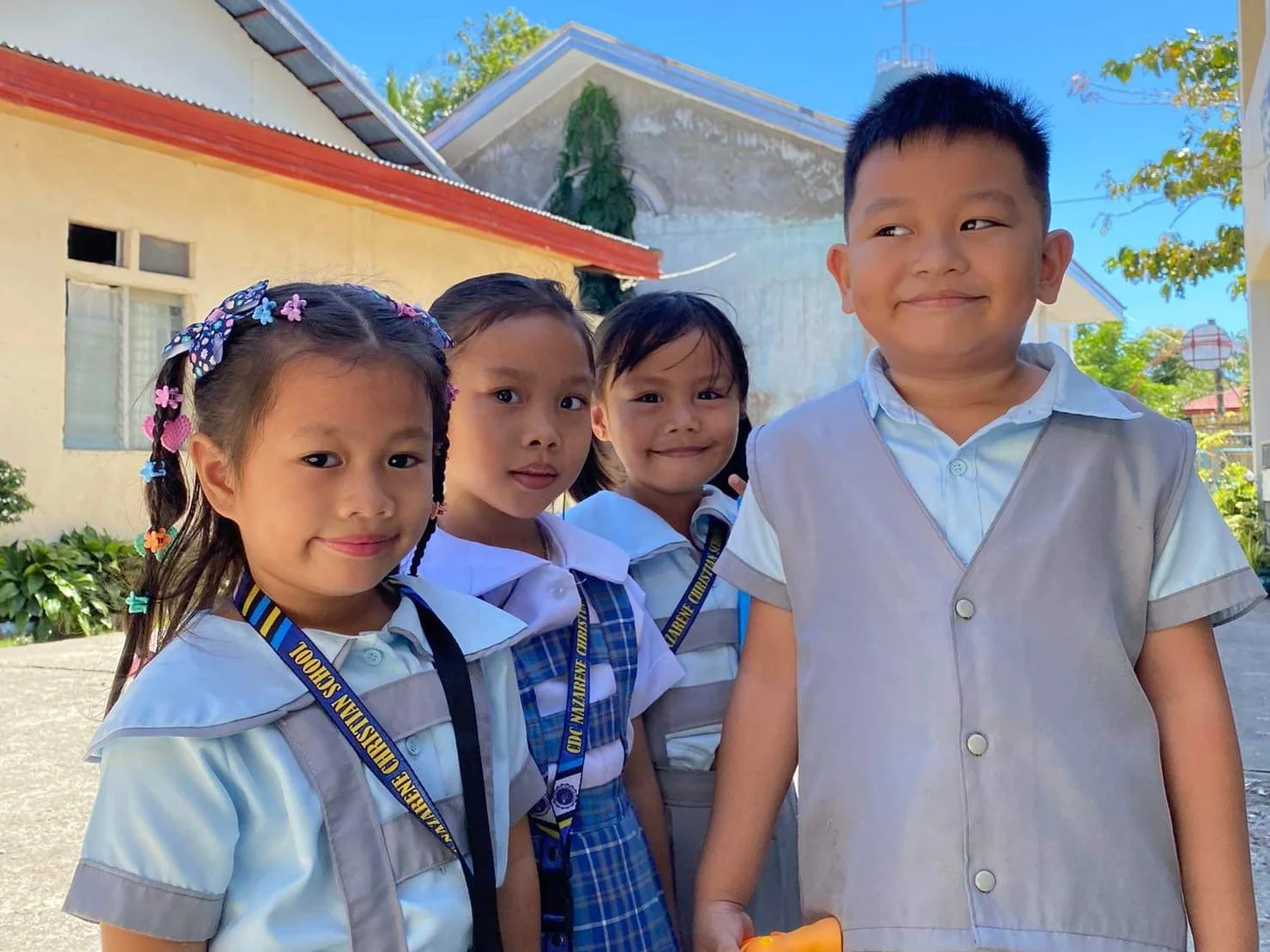Kindergarten students posing for a picture.