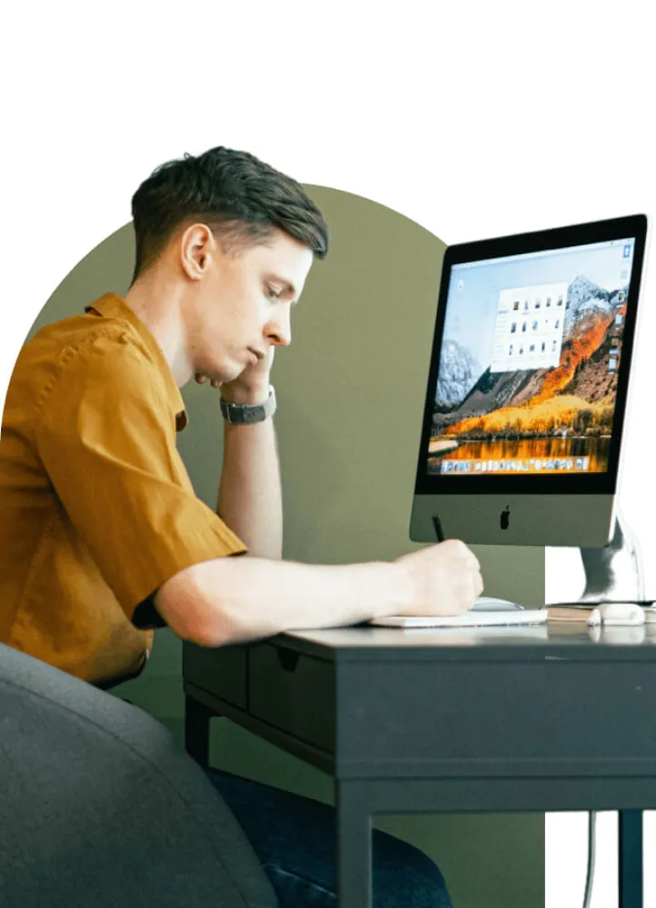 Man unhappy at computer
