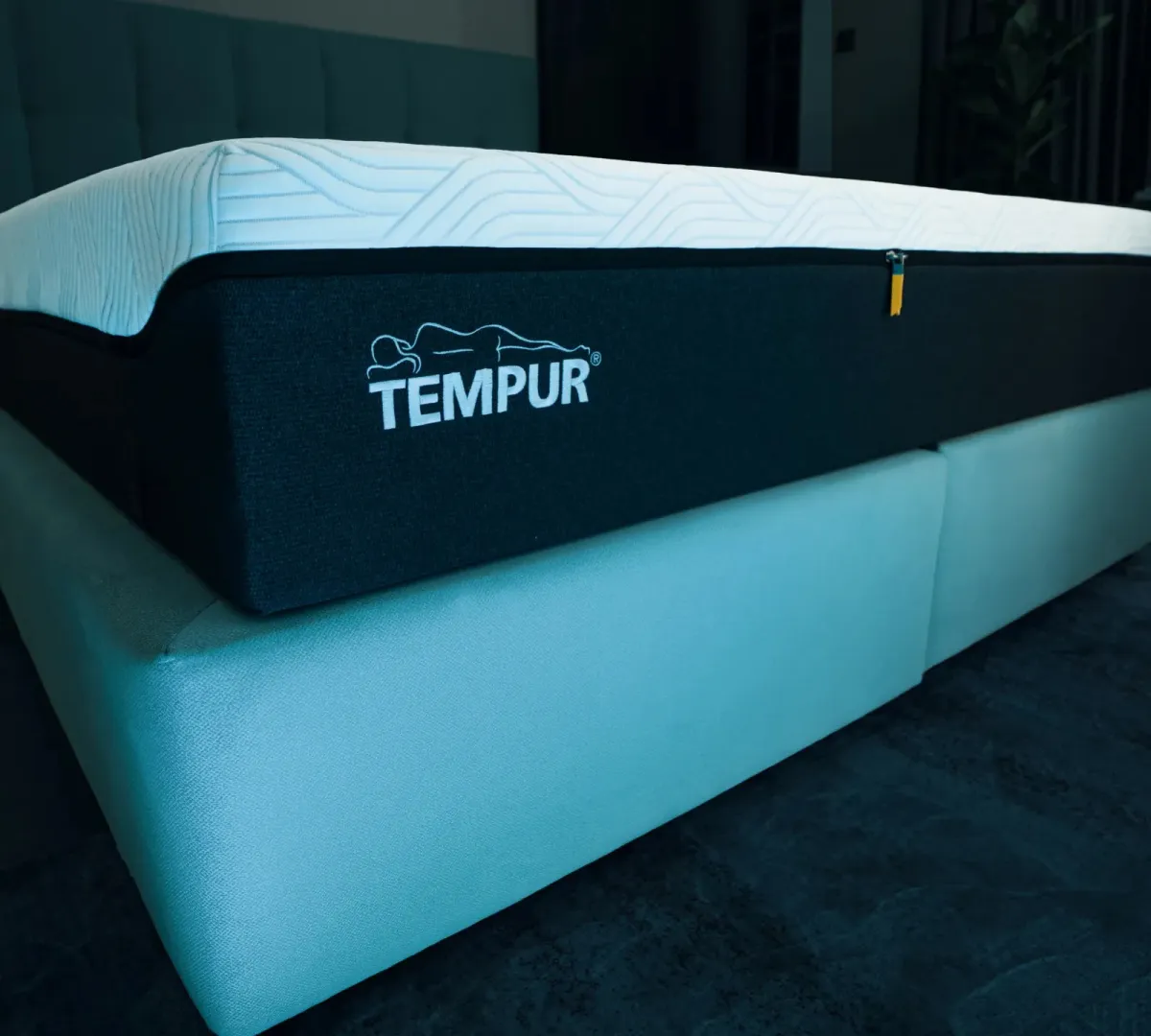 A thick premium mattress in a Nas House bedroom