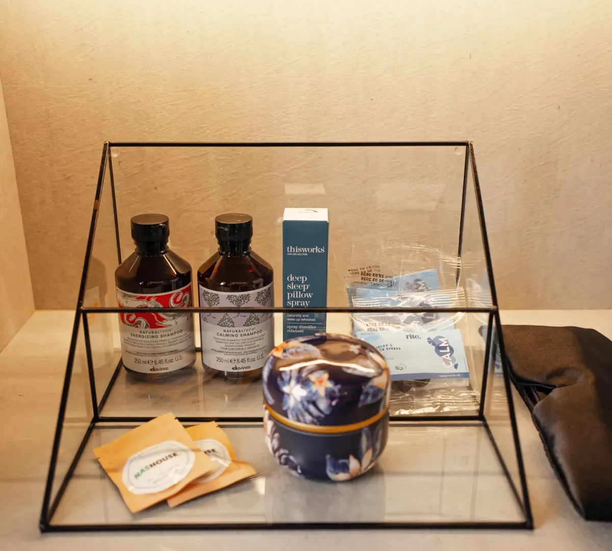 Sleep supplements laid out on a bedside shelf