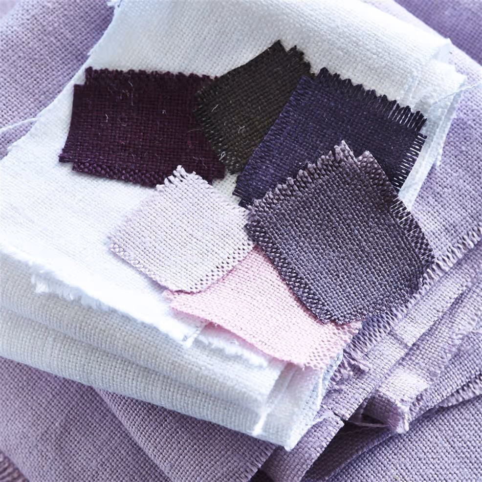 Sample of linen fabrics in purple, lilac and white