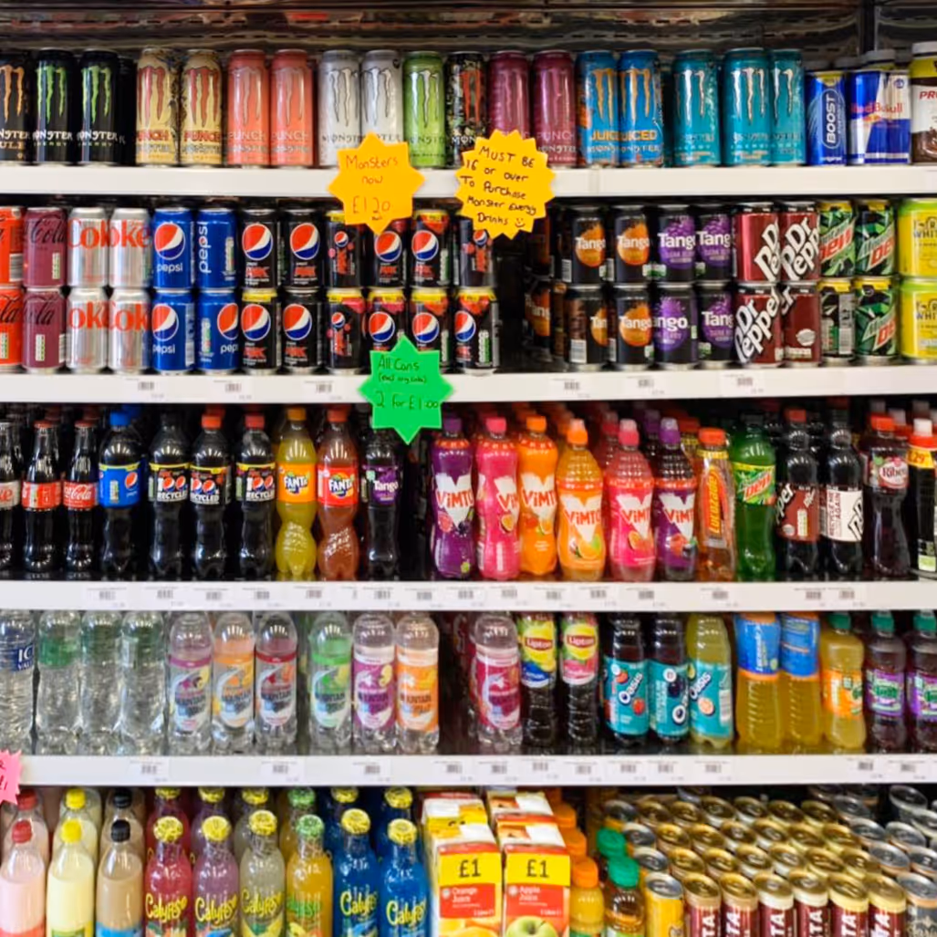 Chiller containing cans of drinks