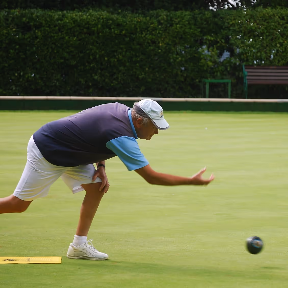 A ball being bowled at Ventnor Bowling Club