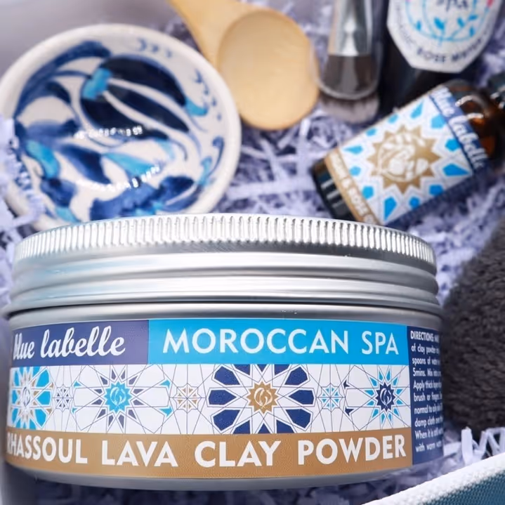 Glass tub of lava clay powder