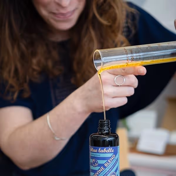 Lady mixing essential oil blends