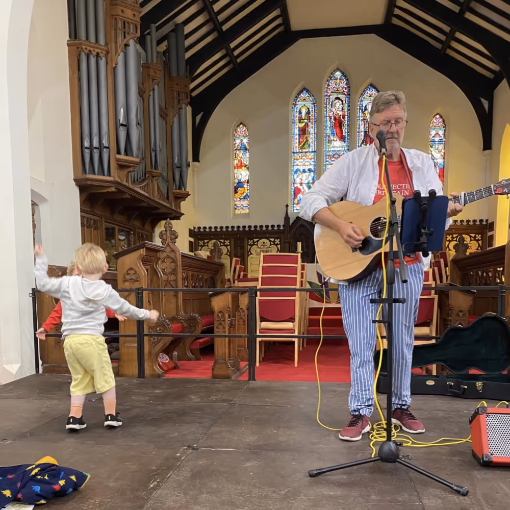 Guitarist in a church