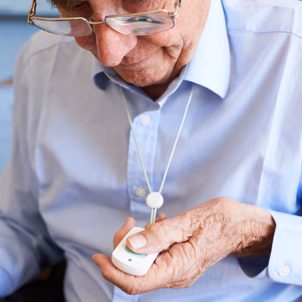 Man pressing his lifeline alarm