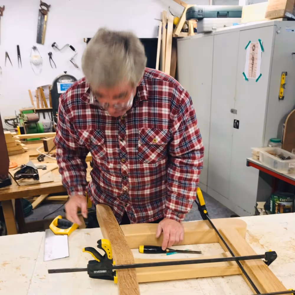 Carpenter making a bench