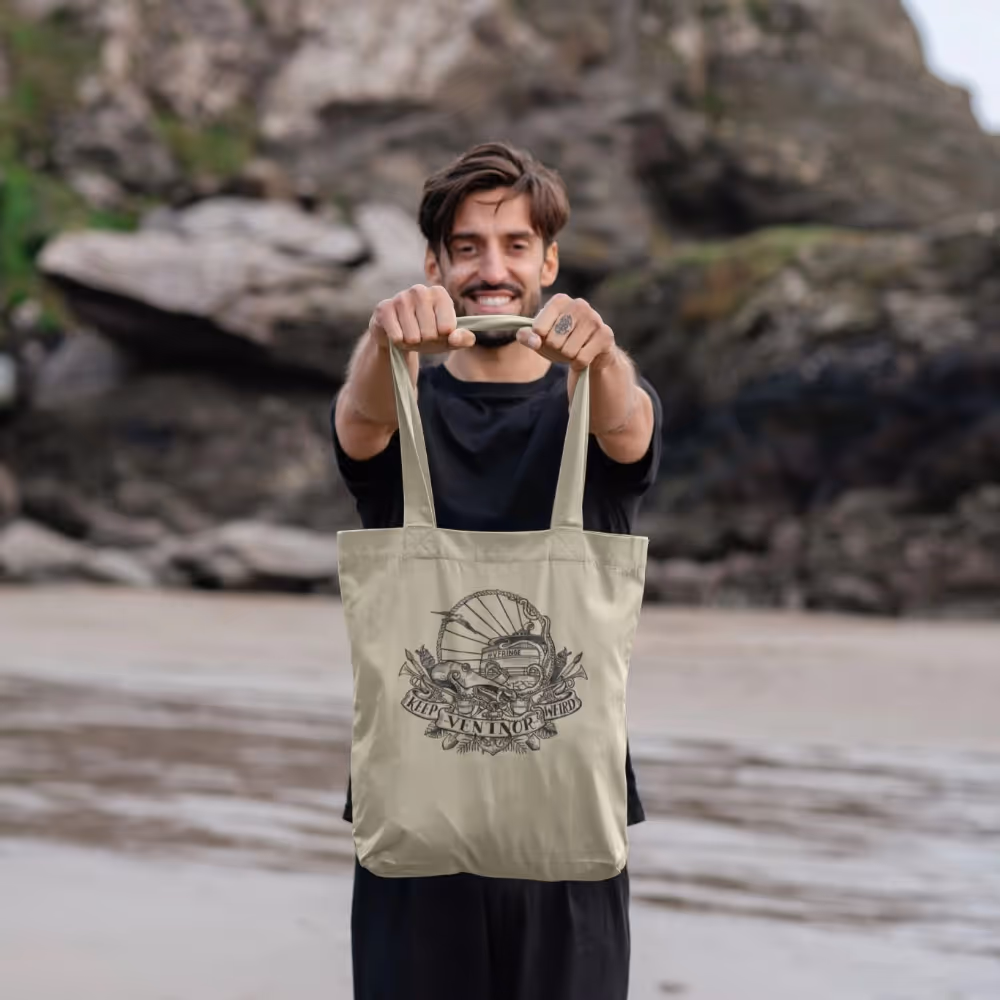 Man holding a bag on a beach