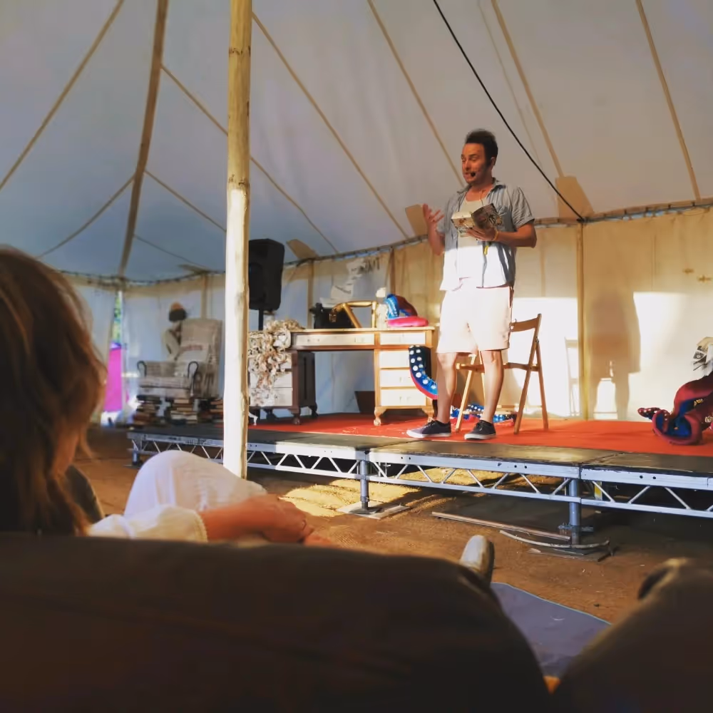 Man speaking on a stage