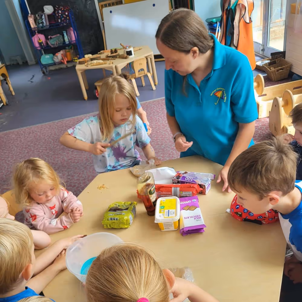 Teacher in a kids play group