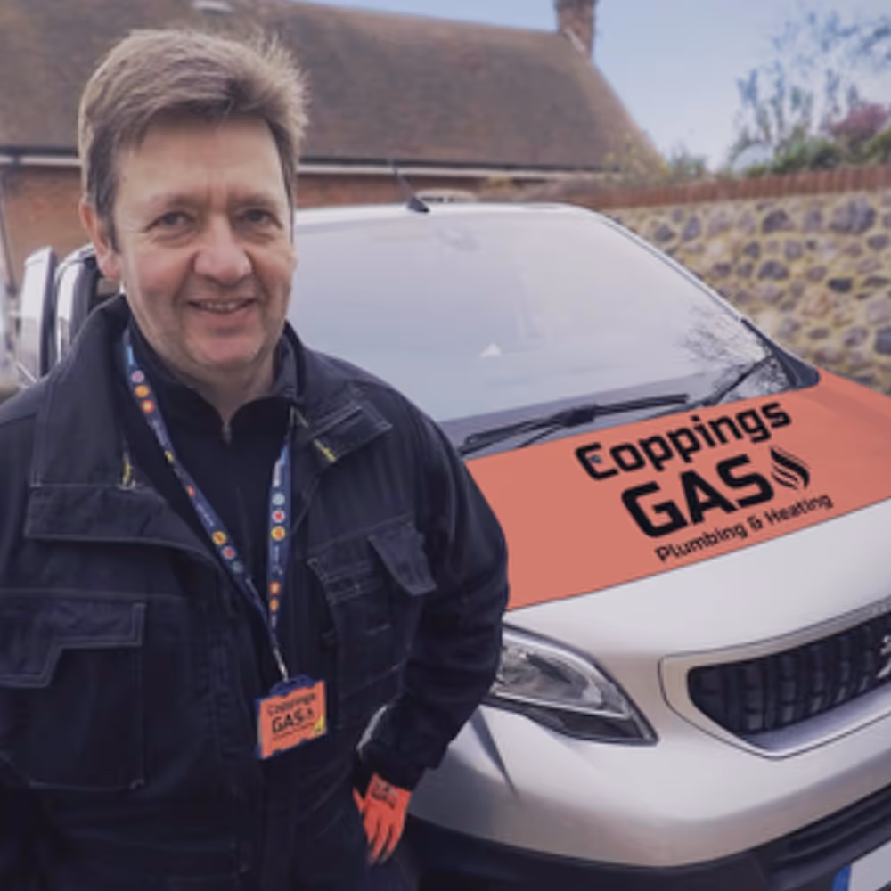 Gas installer by his van