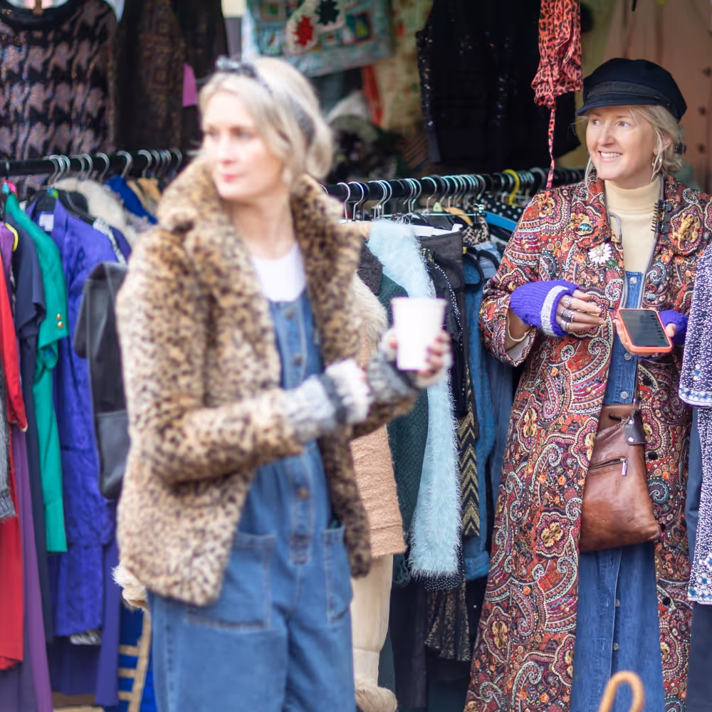 Shoppers at a vintage clothing market