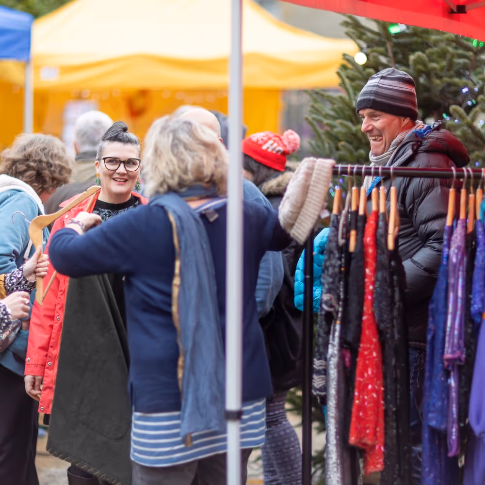Shoppers at a clothing market