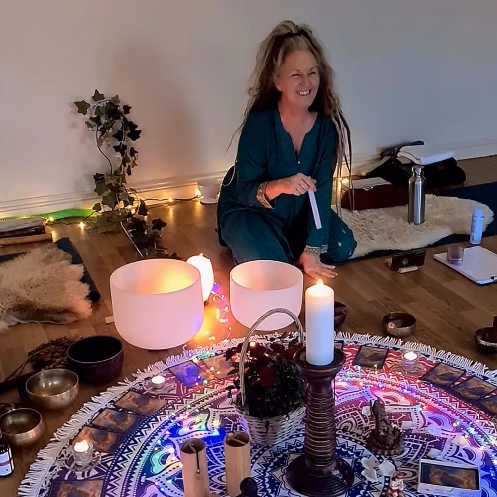 Teacher performing a sound bath