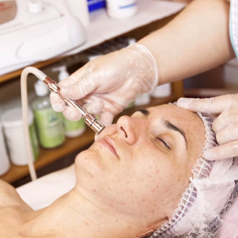 A beauty treatment being performed on a client