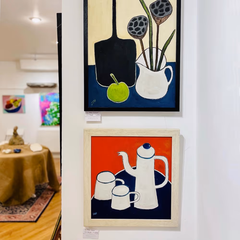 Framed prints at an art show