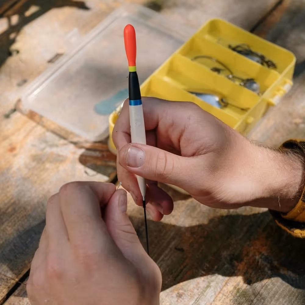 Man making a fishing hook