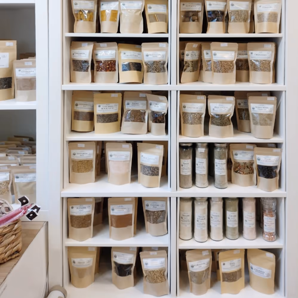 Shelves in a shop displaying packets of tea