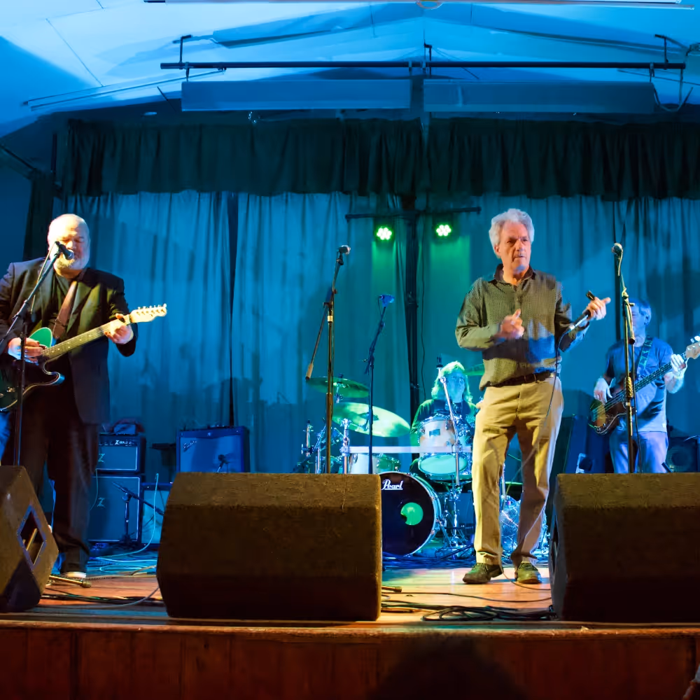 A band playing on a stage