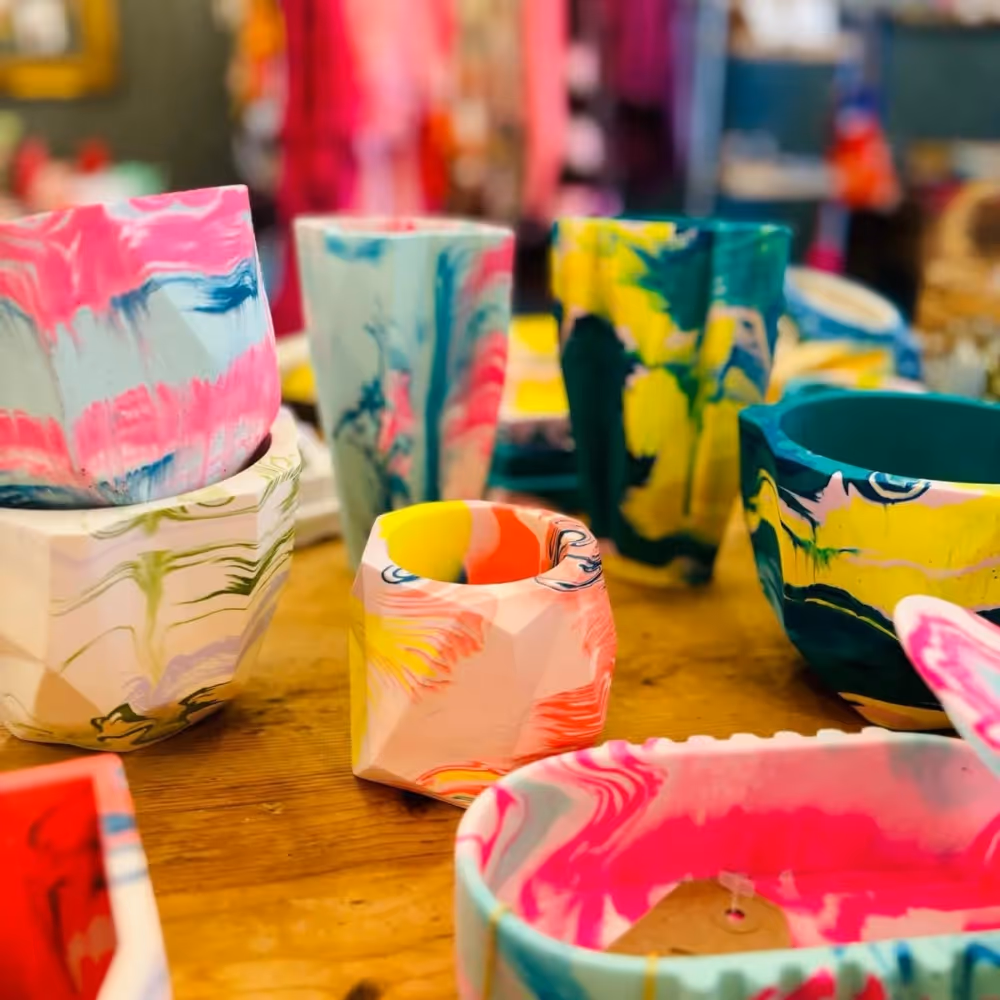 Brightly coloured pen pots