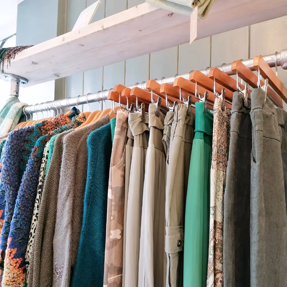 Ladies clothes on a rail in a boutique