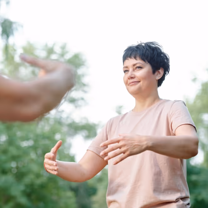A woman practising Qigong