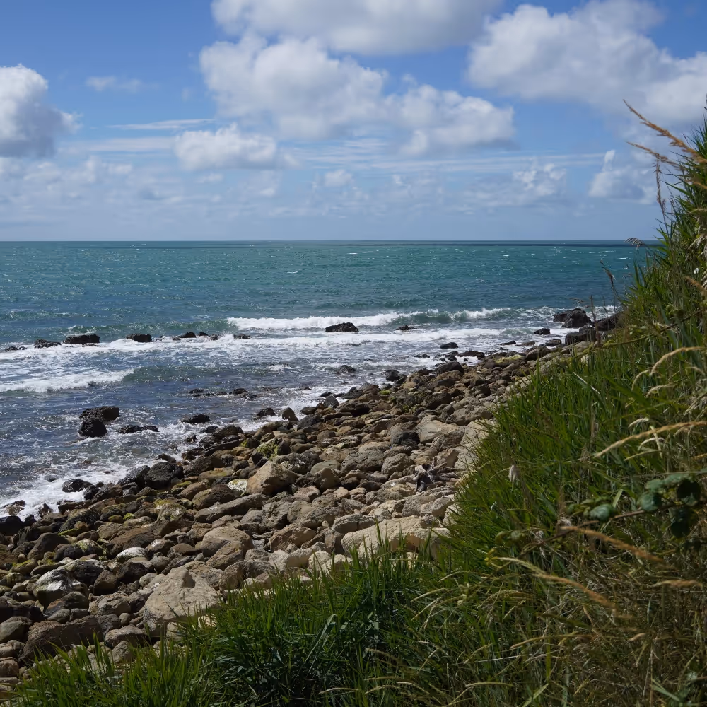 A view looking down to a rocky cove