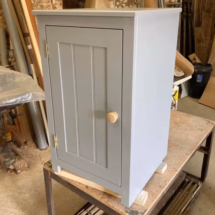 A small grey cupboard