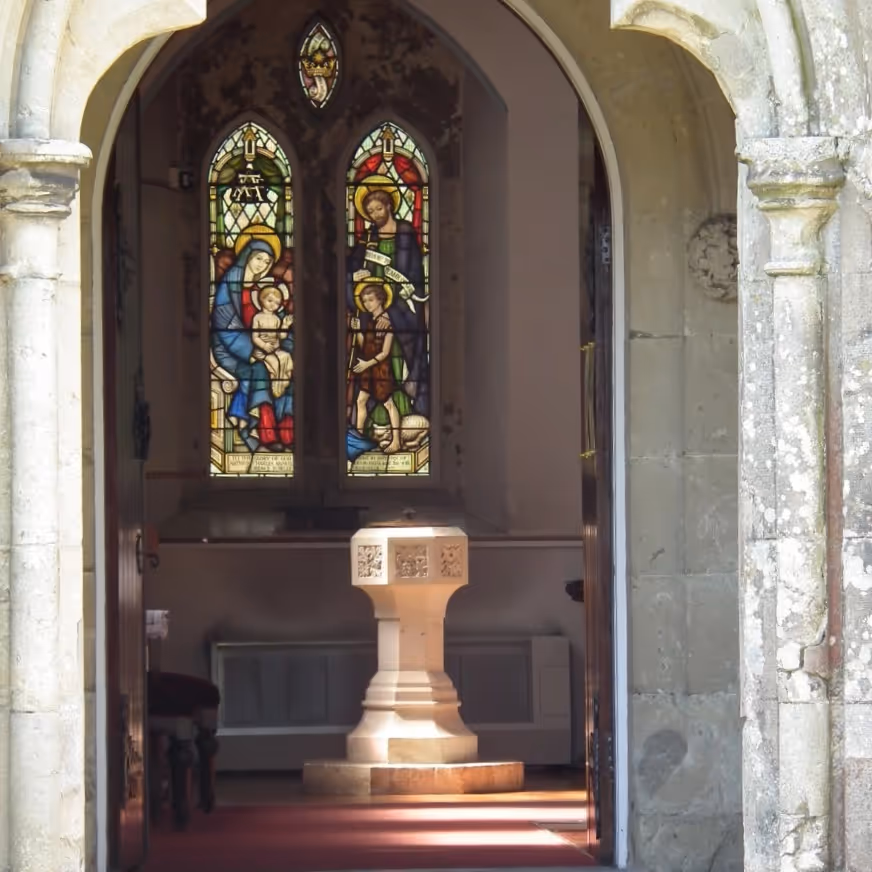 Looking through a stone doorway into a church