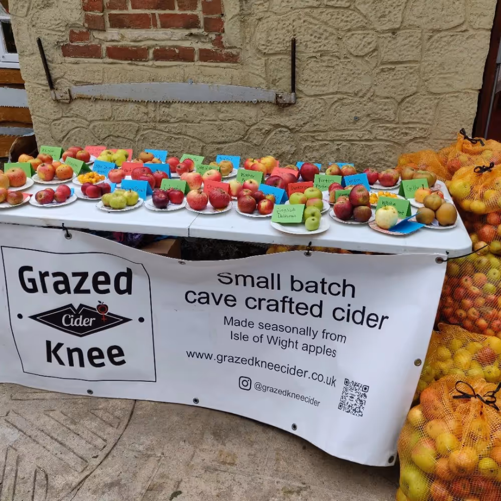 A display table showing the different types of apples grow to make cider
